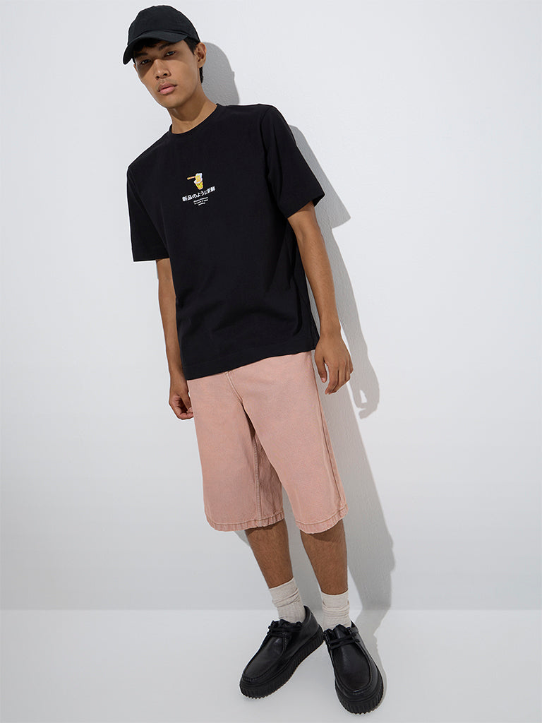 Westside Nuon Men's Black Text Pattern Relaxed-Fit Cotton T-Shirt for Casual Wear Full Model View