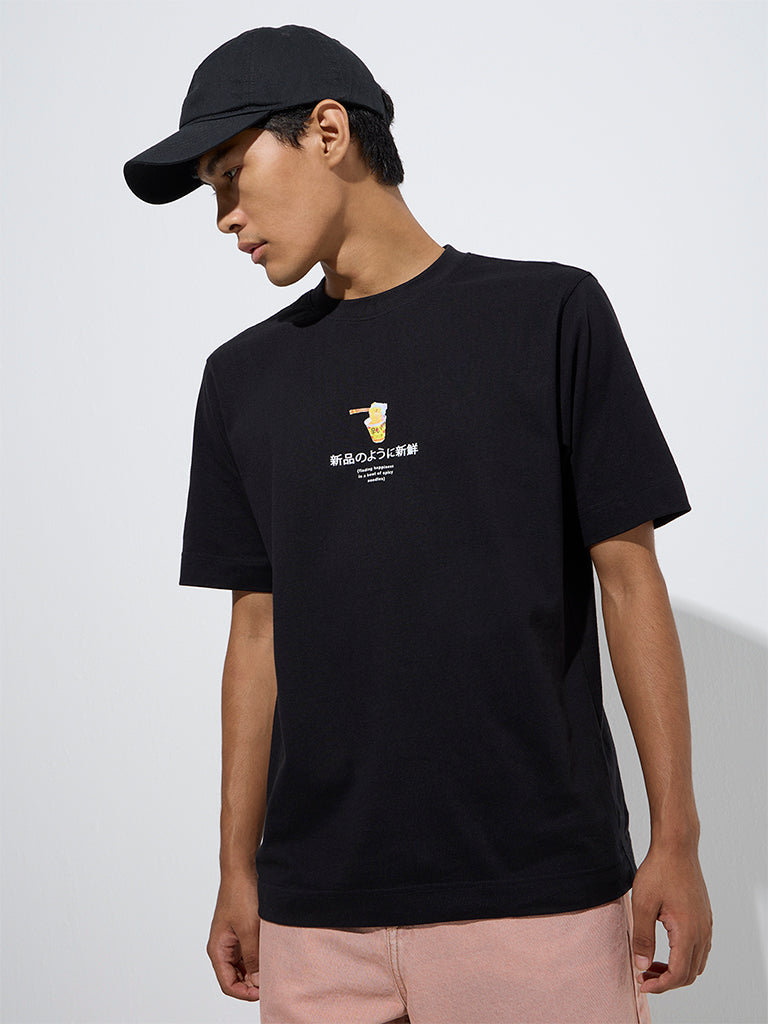 Westside Nuon Men's Black Text Pattern Relaxed-Fit Cotton T-Shirt for Casual Wear Front View