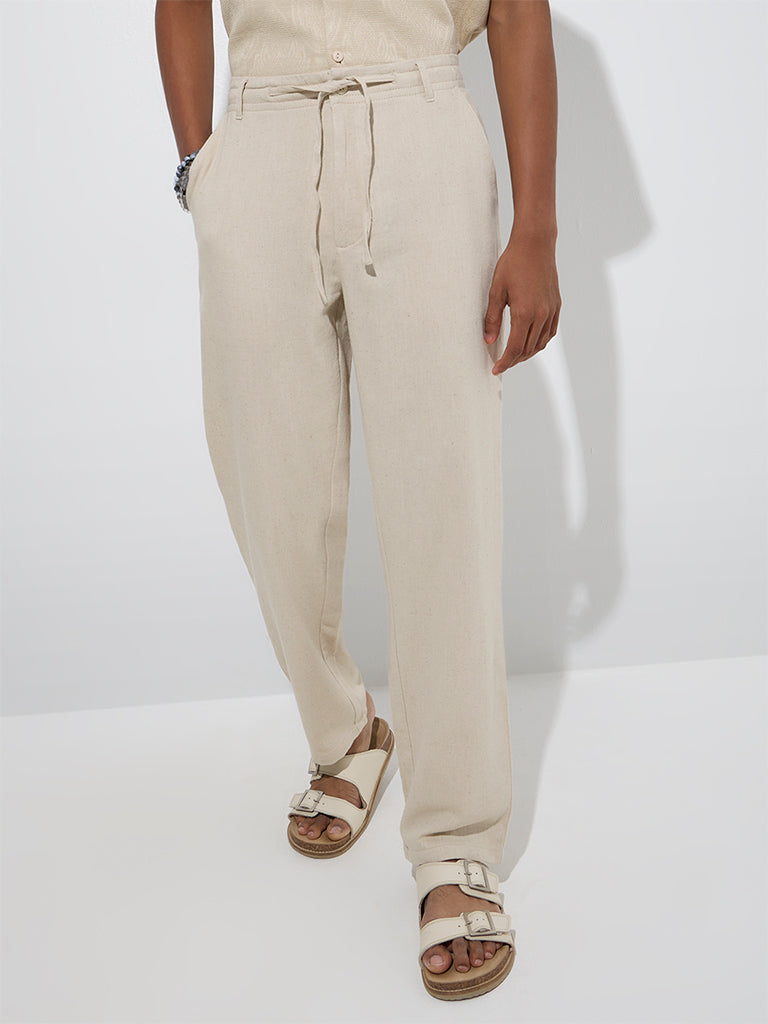 Westside ETA Men's Beige Relaxed-Fit Mid-Rise Cotton-Blend Chinos for Casual Wear Front View
