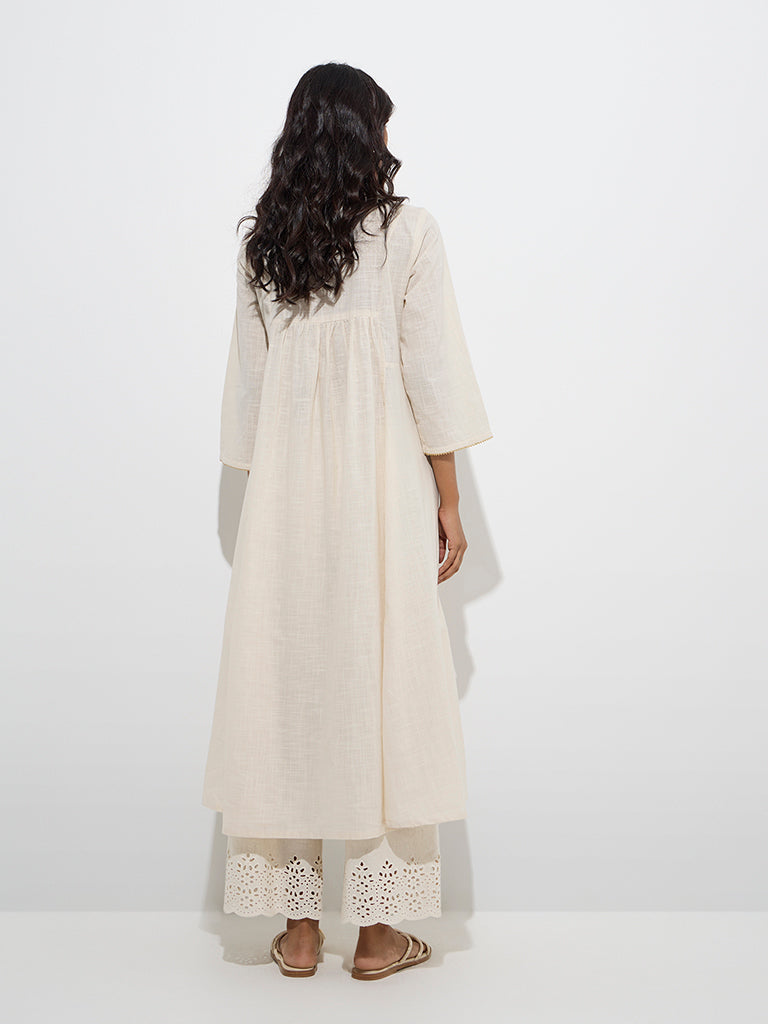 Utsa Beige Floral Embroidered A-Line Cotton Kurta
