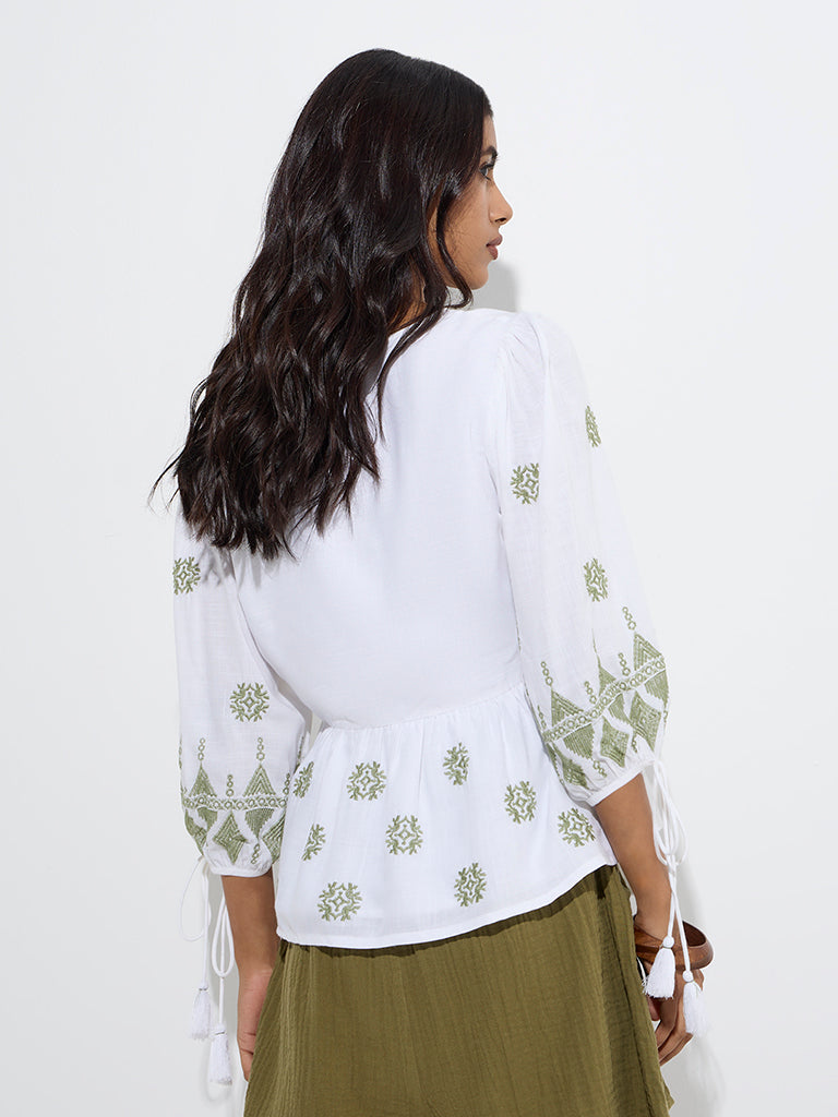 Westside LOV Women's White Embroidered Peplum Top for Casual Wear Back View