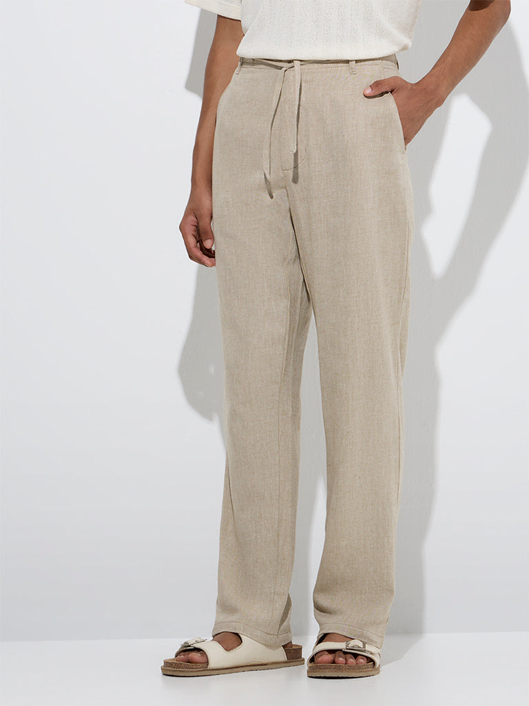 Westside ETA Men's Beige Relaxed-Fit Mid-Rise Cotton-Blend Chinos for Casual Wear Front View
