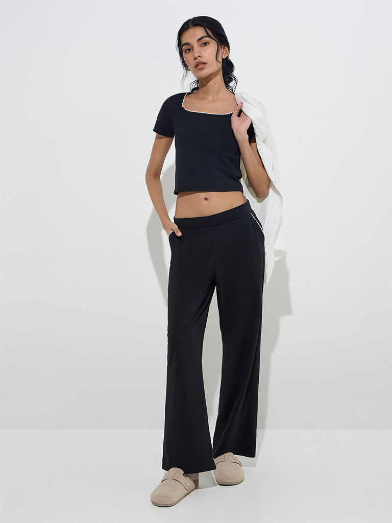 Westside Superstar Women's Black Solid Cotton Top for Casual Wear Full Model View