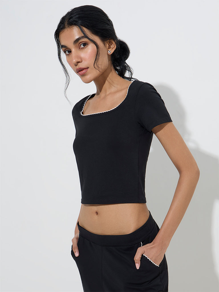 Westside Superstar Women's Black Solid Cotton Top for Casual Wear Front View