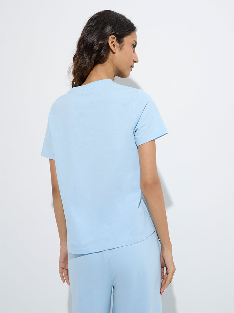 Westside Studiofit Women's Light Blue Typographic Cotton T-Shirt for Sports Wear Back View