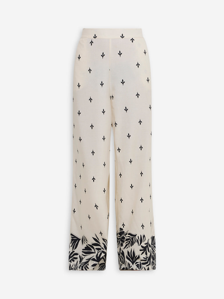 Westside LOV Women's Off-White Leaf Patterned High-Rise Trousers for Casual Wear Flatlay
