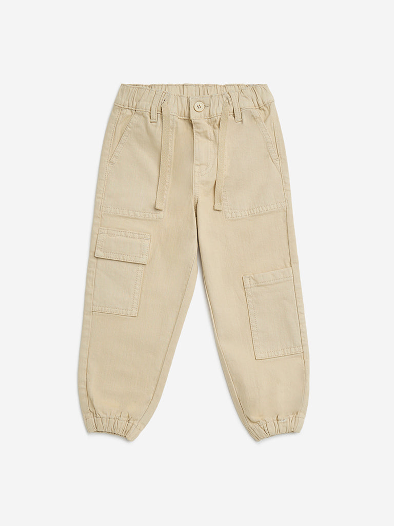 Westside HOP Kids Beige Relaxed-Fit Mid-Rise Jogger-Style Jeans for Casual Wear Front View