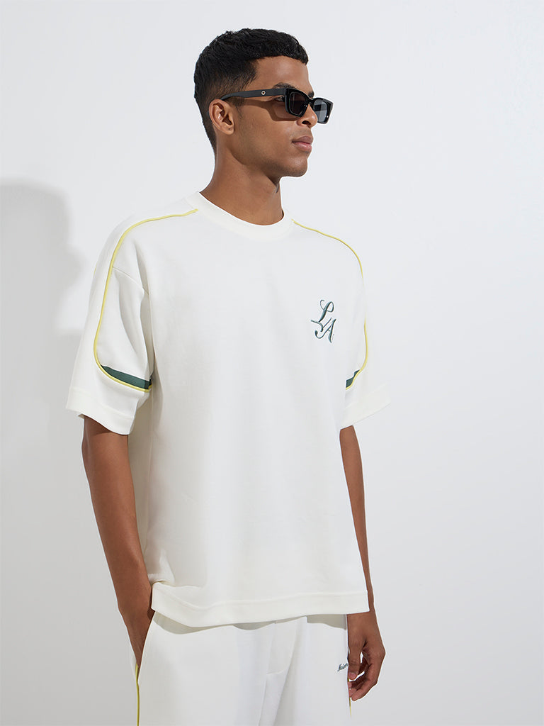 Westside Studiofit Men's White Text Relaxed-Fit Cotton-Blend T-Shirt for Sports Wear Front View