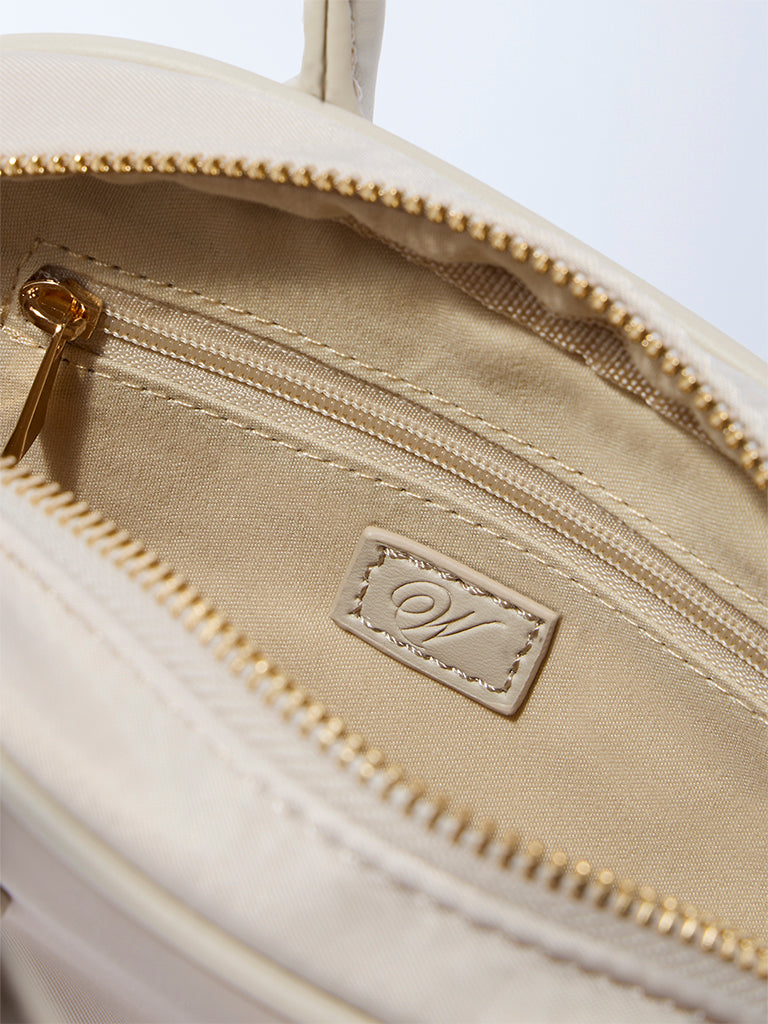 Westside Ivory Bowling Sling Bag