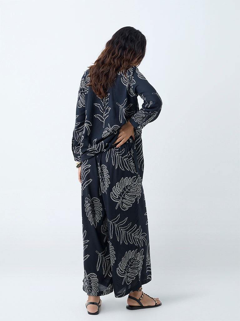 Westside Utsa Women's Black Bandhani Leaf Design Palazzos for Work Wear Back View