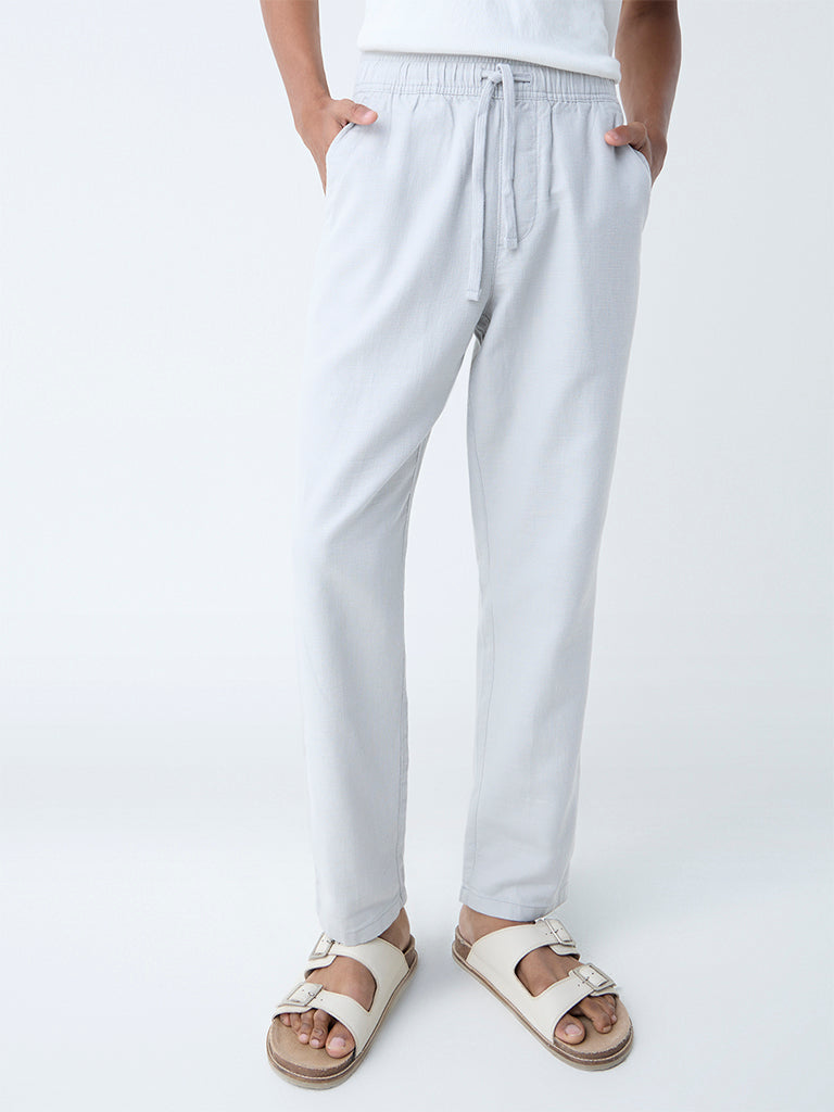 Westside ETA Men's Grey Solid Relaxed-Fit Mid-Rise Cotton Chinos for Casual Wear Front View