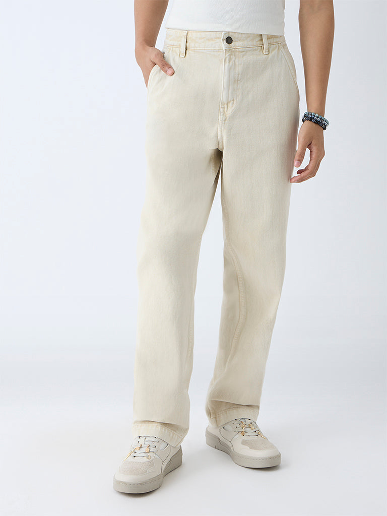 Westside Nuon Men's Beige Relaxed-Fit Mid-Rise Jeans for Casual Wear Front view
