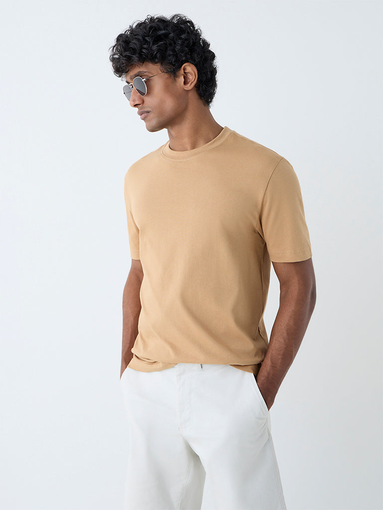 Westside WES Casuals Men's Mustard Solid Slim-Fit Cotton T-Shirt for Casual Wear Front View
