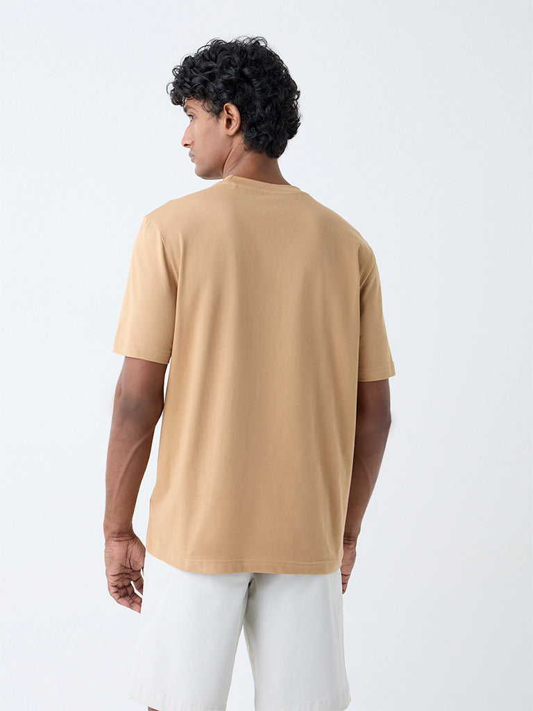 Westside WES Casuals Men's Mustard Solid Slim-Fit Cotton T-Shirt for Casual Wear Back View