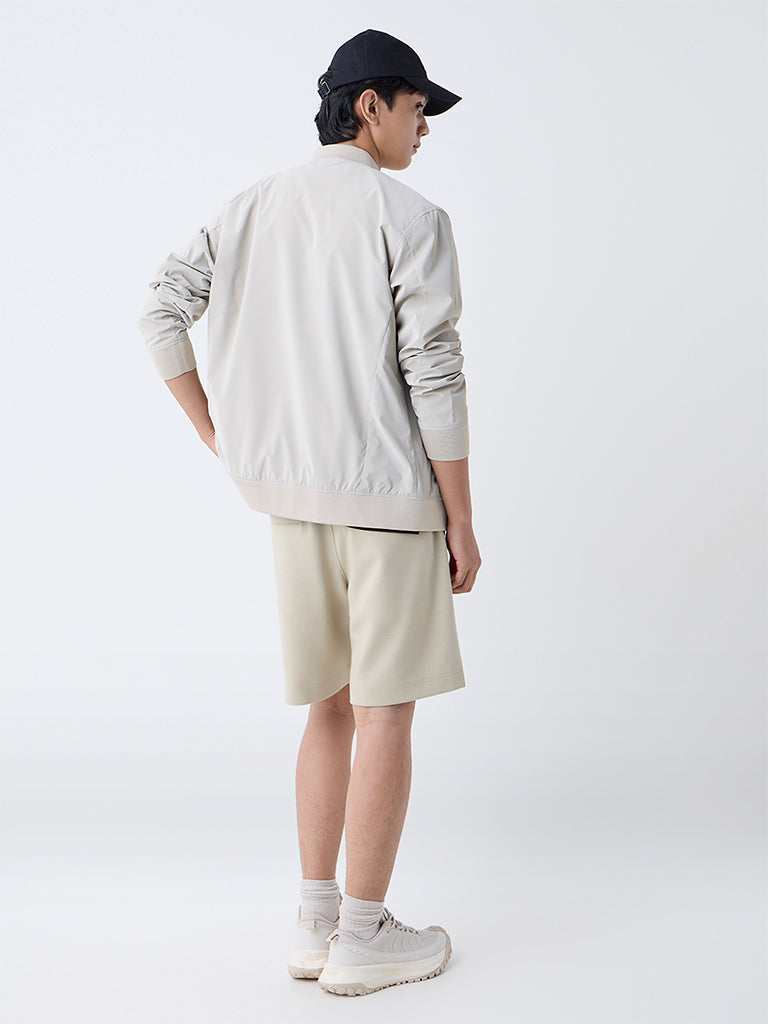 Westside Studiofit Men's Beige Solid Relaxed-Fit Mid-Rise Shorts for Sports Wear Back View
