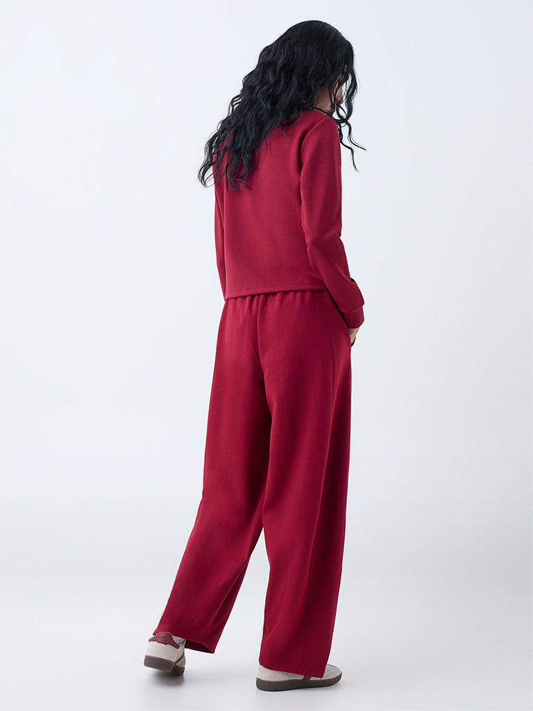 Westside Studiofit Women's Maroon Solid High-Rise Cotton-Blend Track Pants for Sports Wear Back View