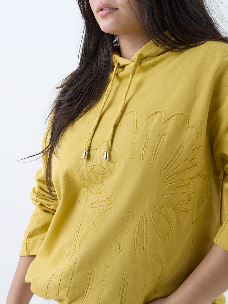 Westside Gia Women's Mustard Floral Embroidered Cotton Hoodie for Winter Wear Zoomed View