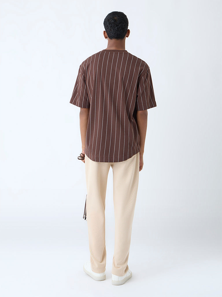 Westside Studiofit Men's Beige Relaxed-Fit Cotton-Blend Track Pants for Sports Wear Back View