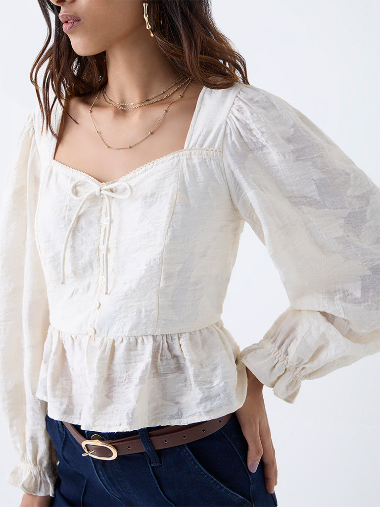 LOV Off-White Self-Patterned Peplum Top