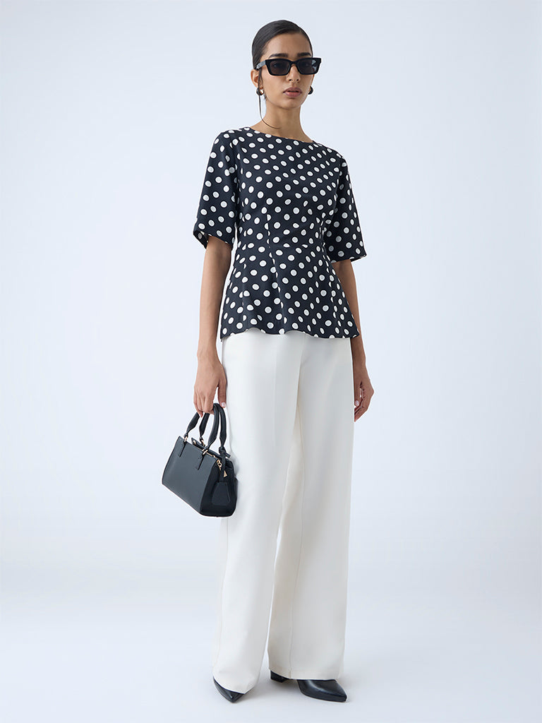 Wardrobe Black Polka Dotted Peplum Top