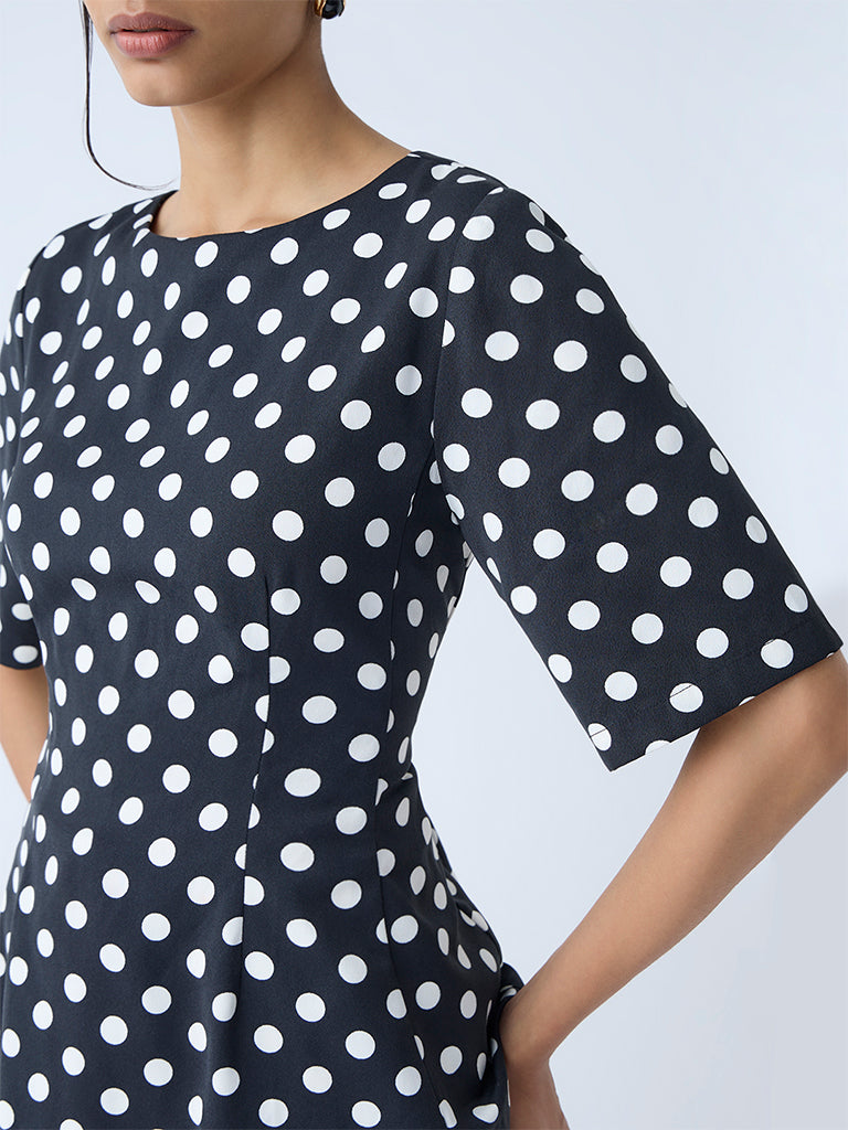 Wardrobe Black Polka Dotted Peplum Top