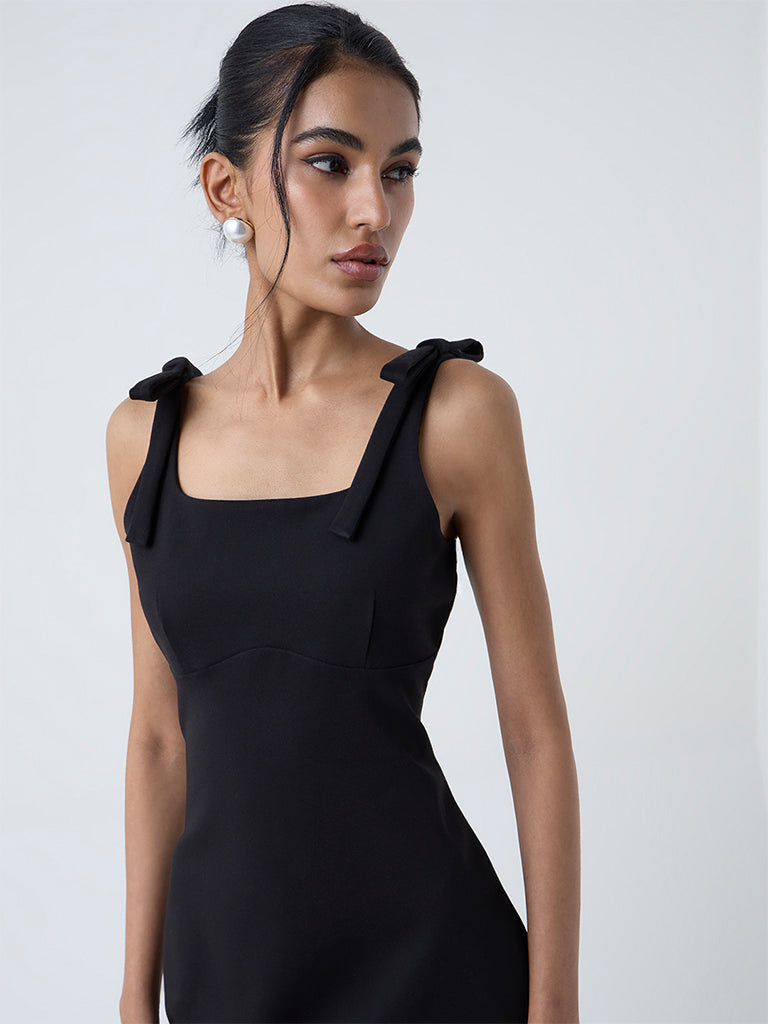 Buy Nuon Black Solid Sheath Dress from Westside