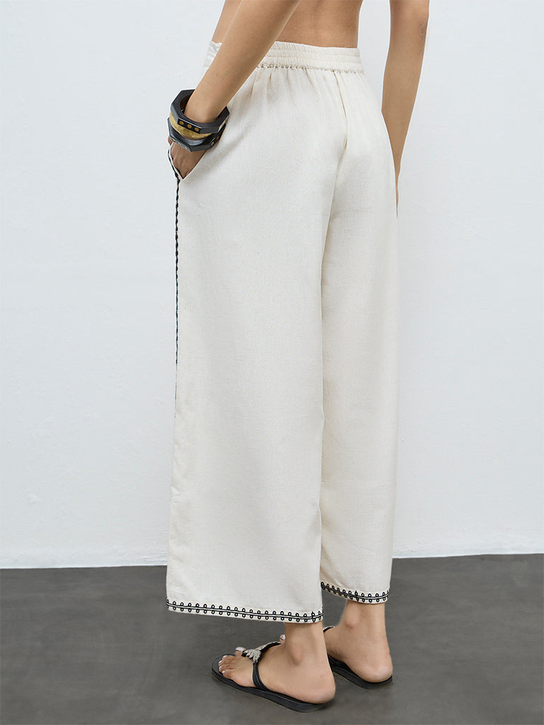 Utsa Off-White Embroidered Cotton-Blend Pants