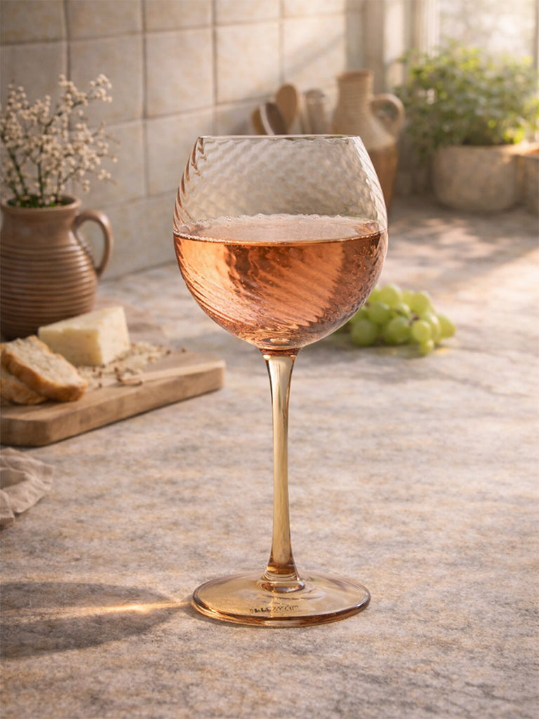 Buy Westside Home Amber Round Swirl Coupe Glass from Westside