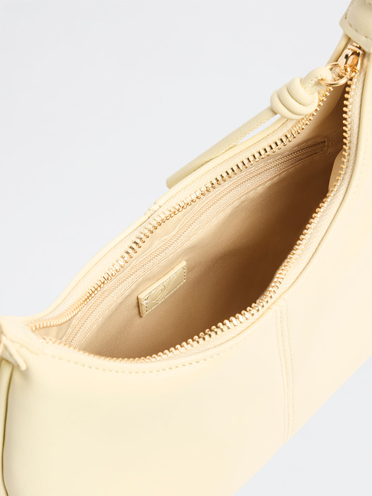Westside Cream Crescent Sling Bag