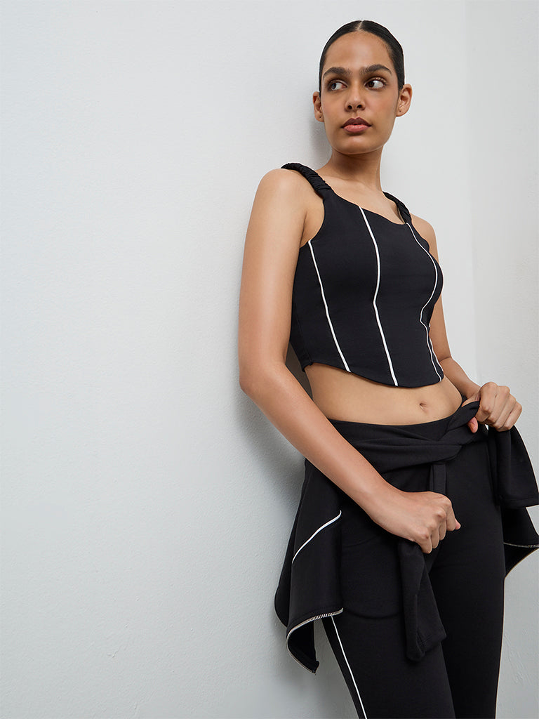 Buy Nuoflexx Black Pipeline-Detailed Cotton-Blend Top from Westside