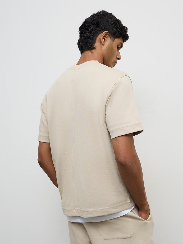 Nuoflexx Beige Text Printed Relaxed-Fit Cotton-Blend T-Shirt