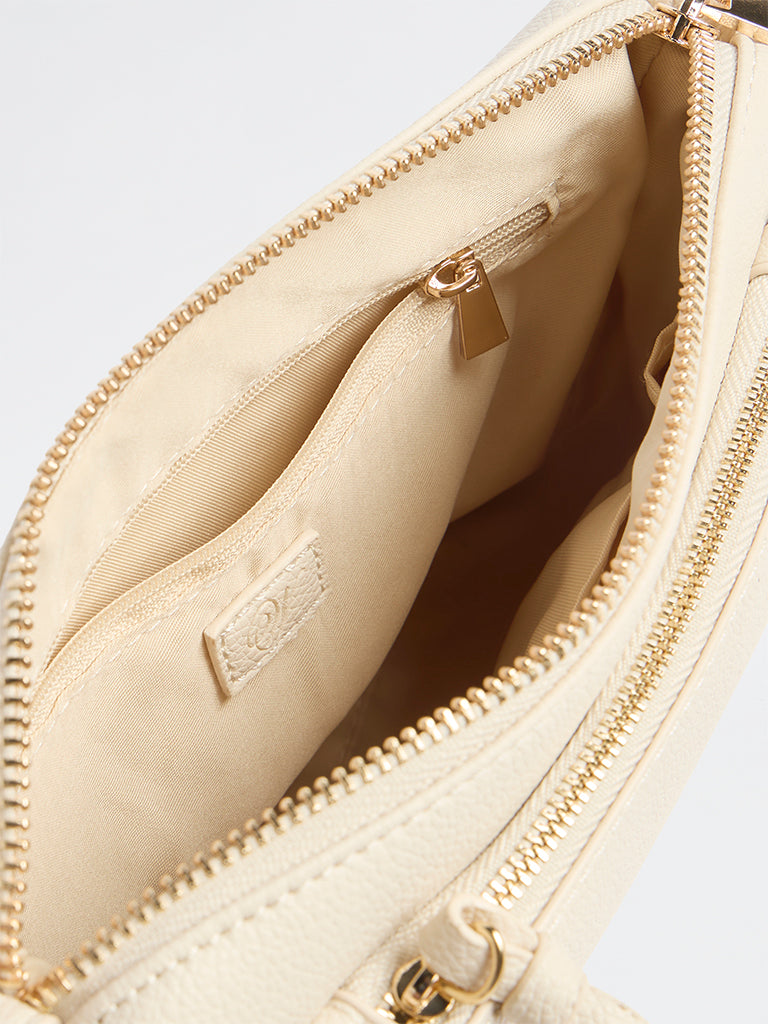 Westside Off-White Stud-Detail Textured Sling Bag