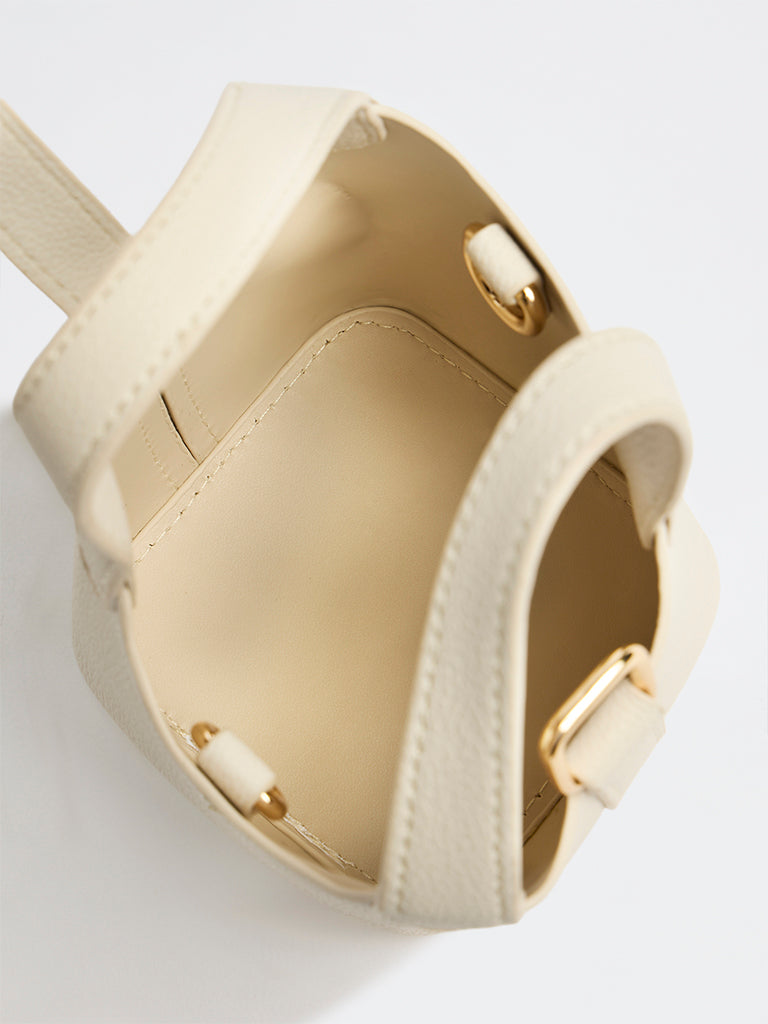 Westside Accessories Off-White Textured Bucket Sling Bag