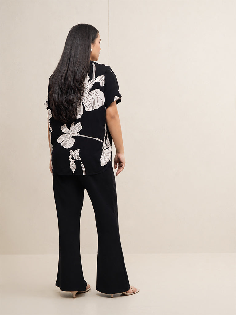 Gia Black High-Rise Flared Trousers