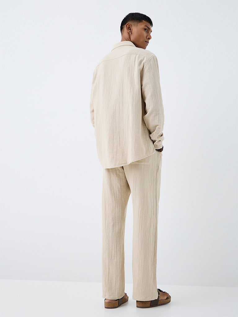 ETA Off-White Textured Relaxed-Fit Mid-Rise Cotton Chinos