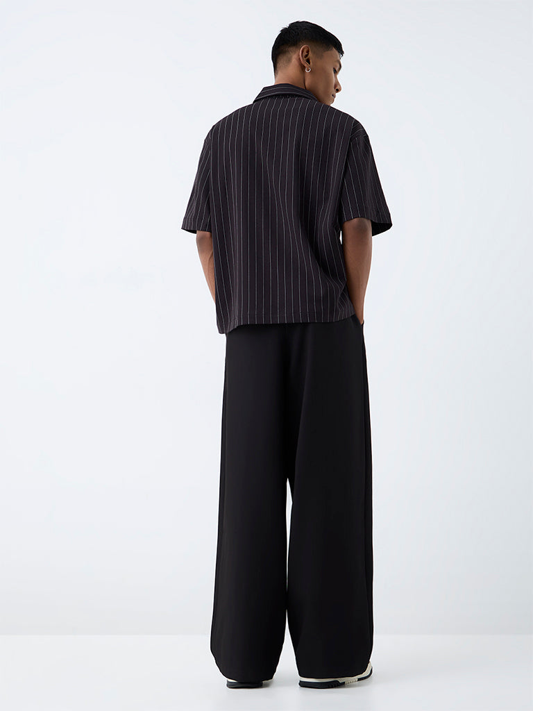 Nuon Black Pleated Loose-Fit Mid-Rise Cotton Trousers