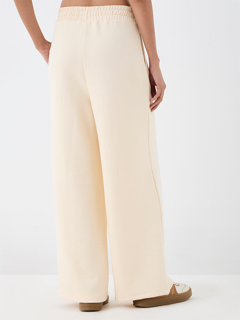 Nuoflexx Cream Solid High-Rise Track Pants
