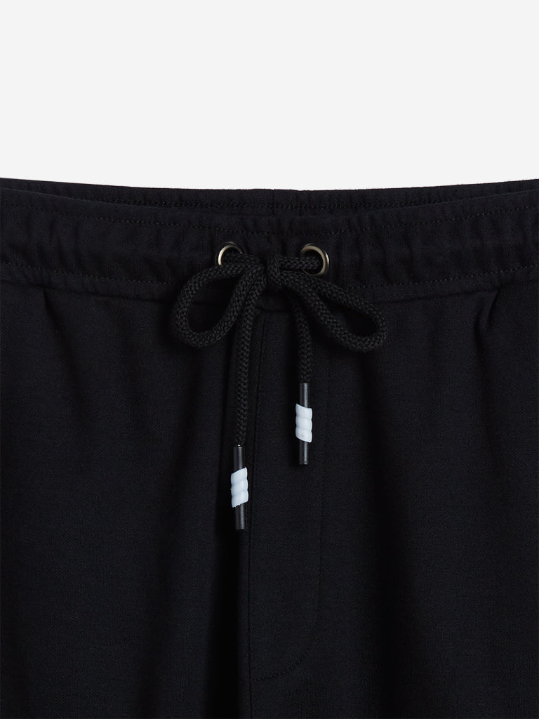 Westside Studiofit Men's Black Text Print Slim Fit Shorts for Sports Wear Zoomed View