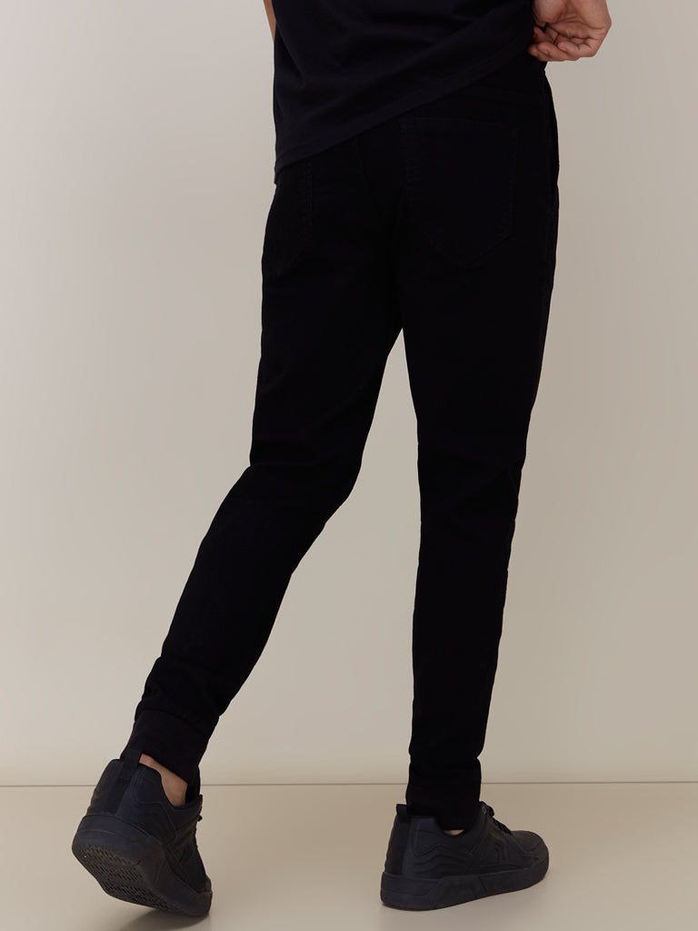 Nuon Black Carrot-Fit Jogger-Style Jeans | Nuon Black Carrot-Fit Jogger-Style Jeans for Men Back View - Westside