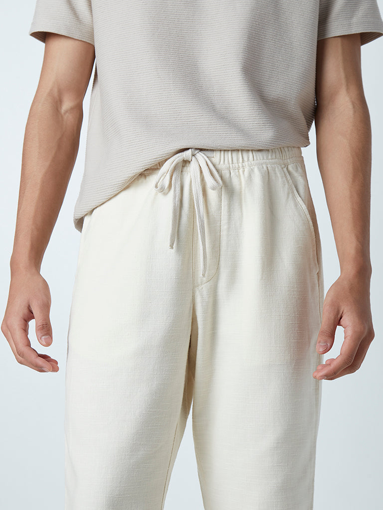 Westside ETA Men's Ecru Cotton Slim-Fit Mid-Rise Chinos for Casual Wear Zoomed View