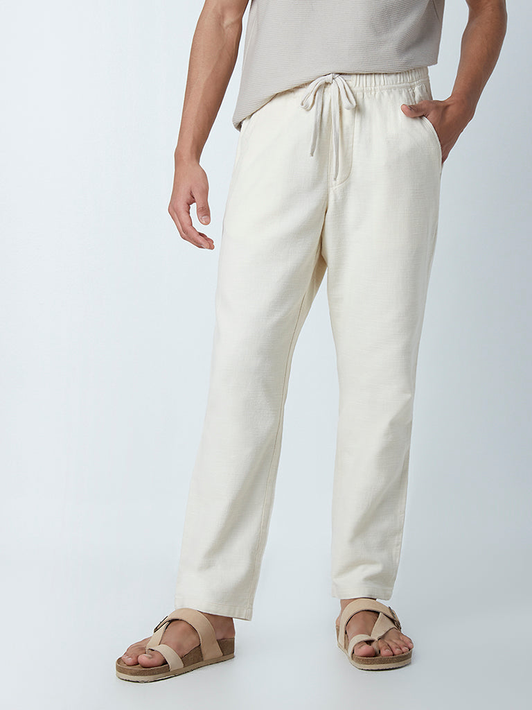 Westside ETA Men's Ecru Cotton Slim-Fit Mid-Rise Chinos for Casual Wear Front View