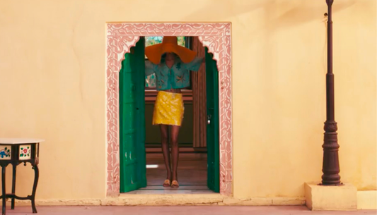 Woman wearing a breezy summer skirt styled for an effortless daytime look at Westside