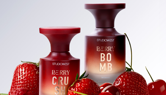 Woman applying perfume, representing Westside Studiowest fragrance collection