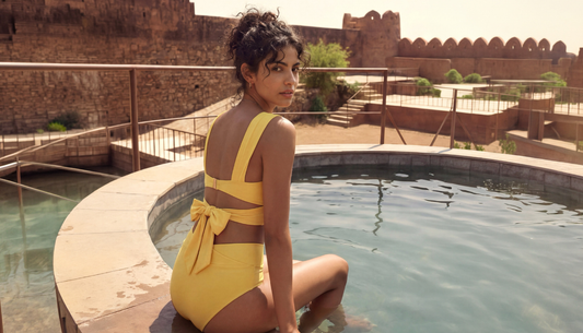 Woman in stylish swimwear with confident poolside holiday look at Westside