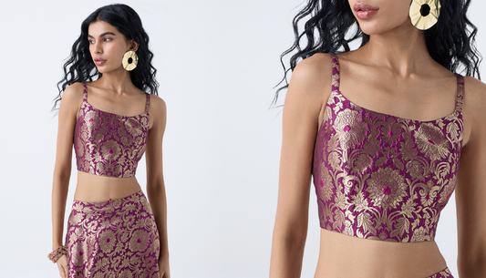 Model wearing stylish festive blouse from Westside paired with saree