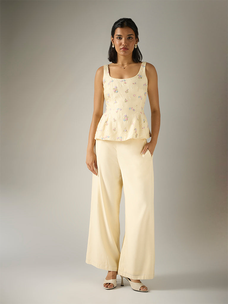 Embroidered Peplum Top – Cream