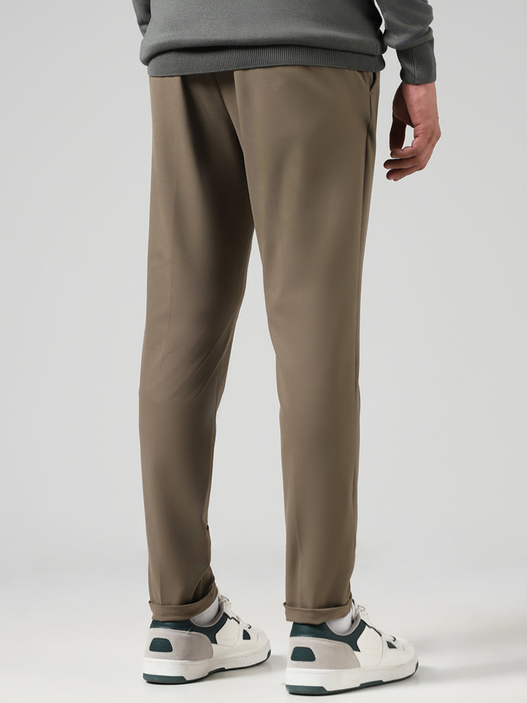 WES Formals Solid Khaki Carrot Fit Trousers