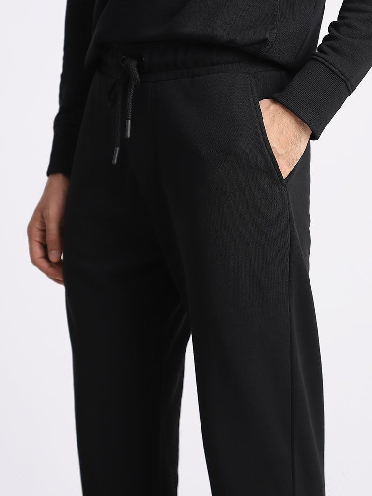 WES Casuals Solid Black Relaxed Fit Trackpants