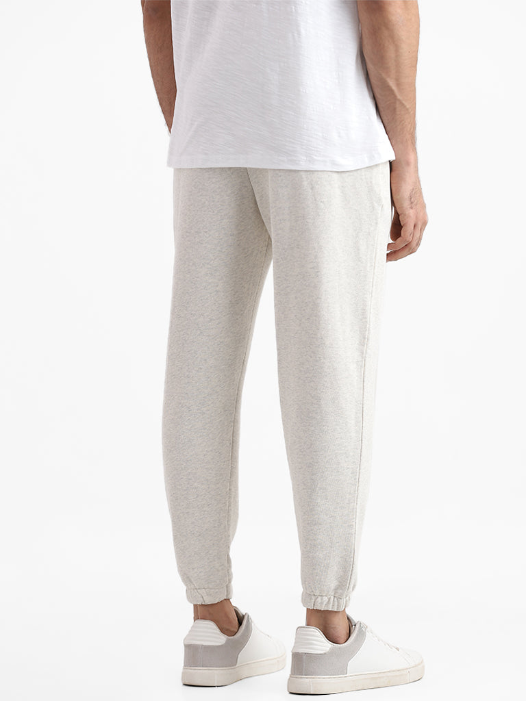 WES Casuals Cream Slim Fit Mid Rise Joggers