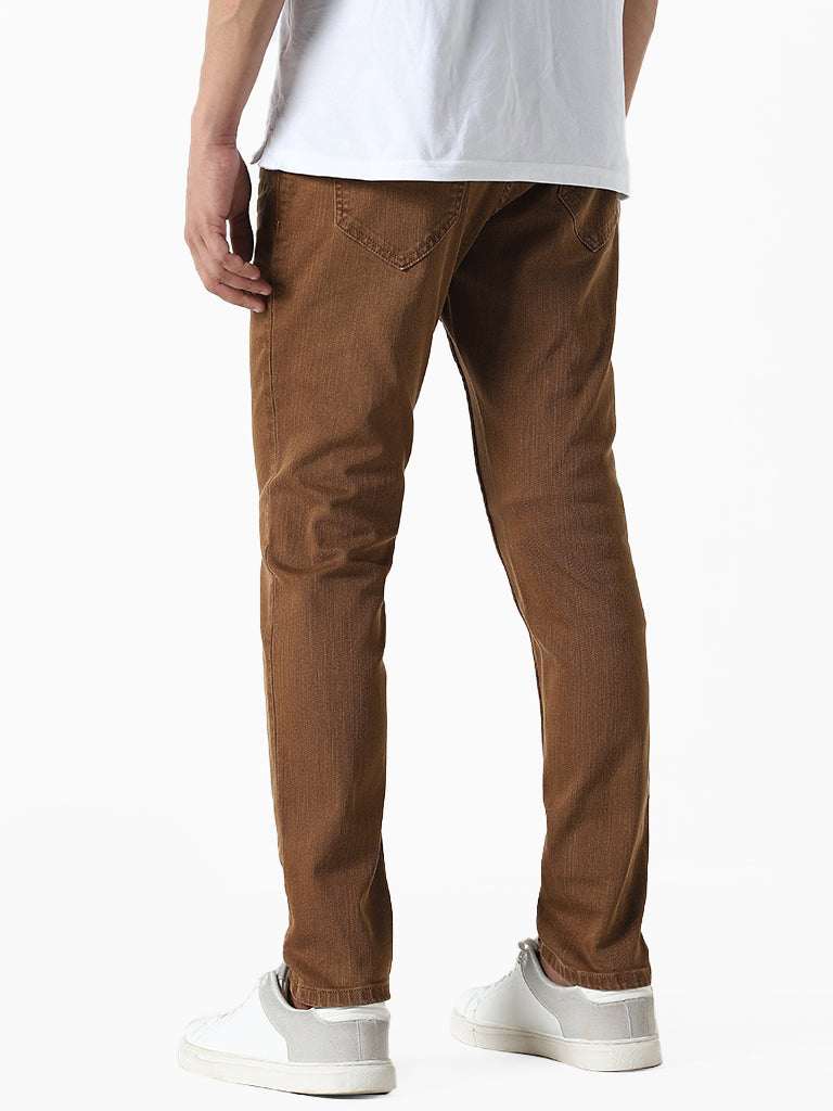 WES Casuals Solid Brown  Denim Slim Fit Mid Rise Jeans